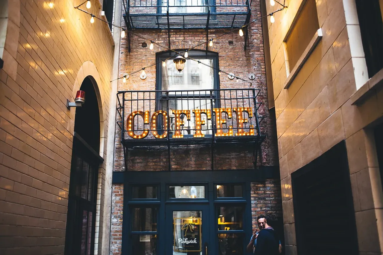 Entrance of a coffee shop in a brick building