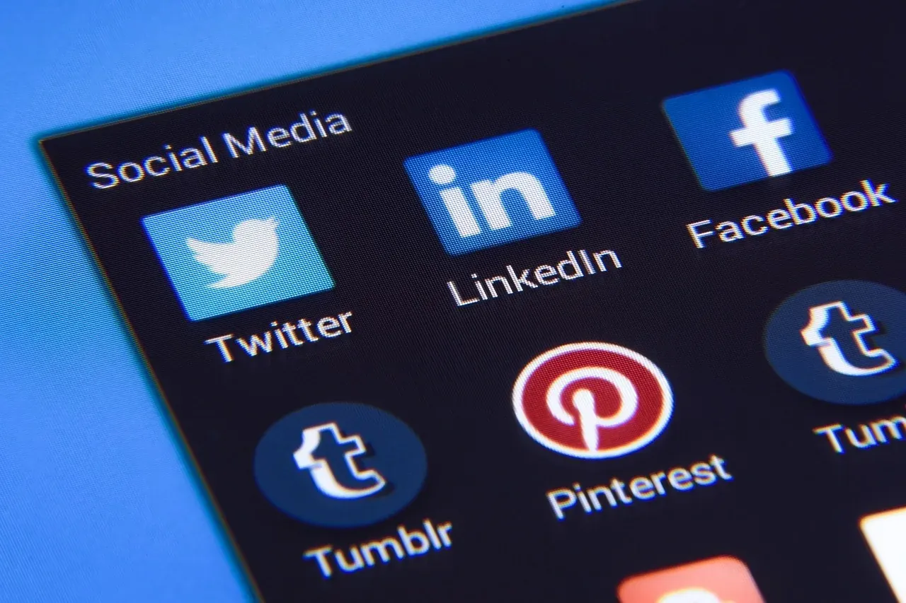 Close-up of social media app icons on a screen